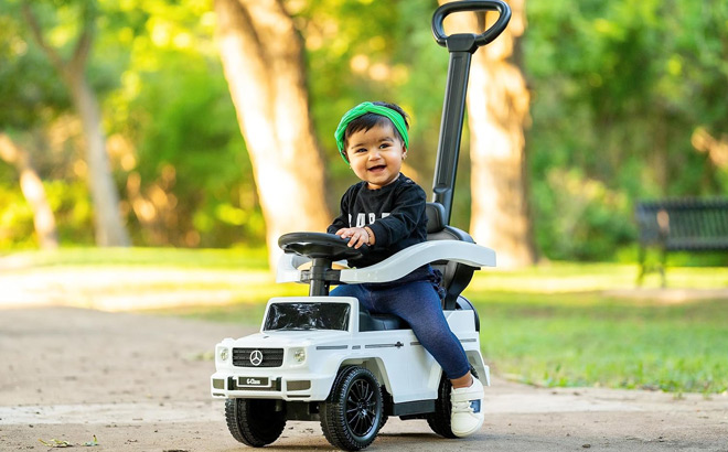 a Kid Riding Mercedes Push Car