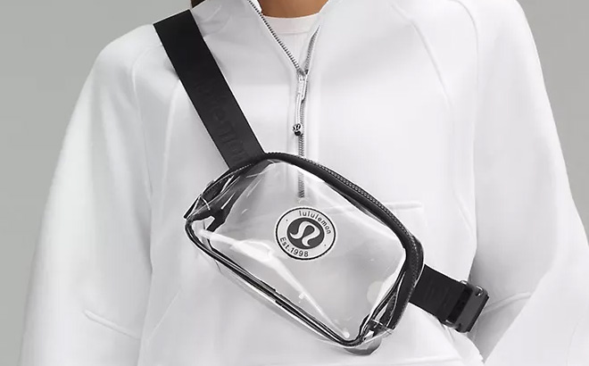 a Woman Wearing Lululemon Clear Logo Belt Bag