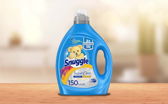 an Image of Snuggle SuperCare Laundry Fabric Softener Liquid on a Wooden Table