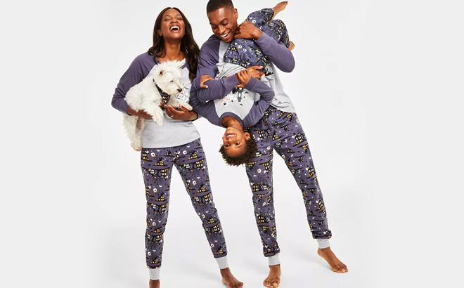 an Image of a Family Wearing a Spooky Halloween Matching Pajamas
