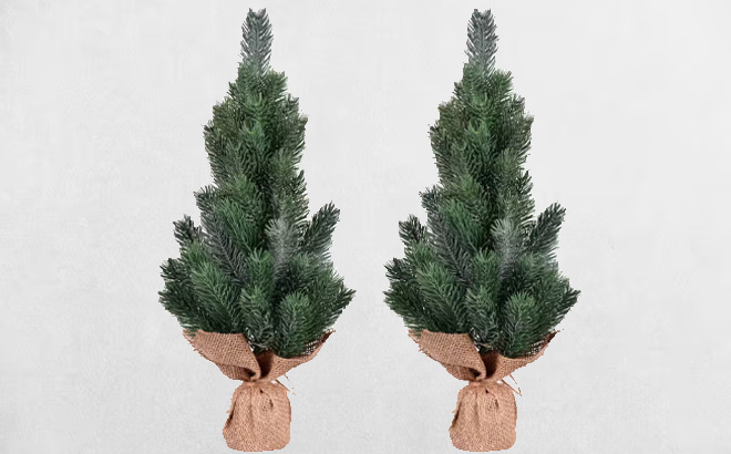 15 Inch Spruce Sapling Artificial Christmas Tree Set on a Gray Background