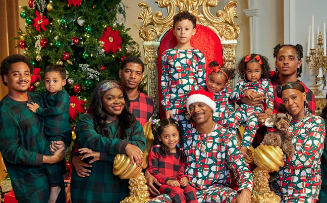 A Big Family Wearing Matching Family Santa Pajamas