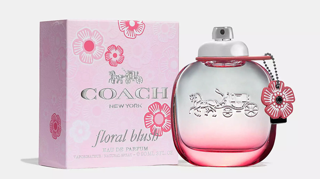 A Box and Bottle of Coach Outlet Floral Blush Eau De Parfum in Gray Background
