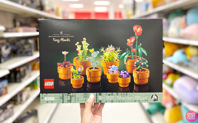 A Hand Holding LEGO Botanical Collection Tiny Plants Building Set