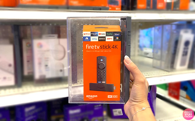 A Hand Holding a Amazon Fire TV Stick