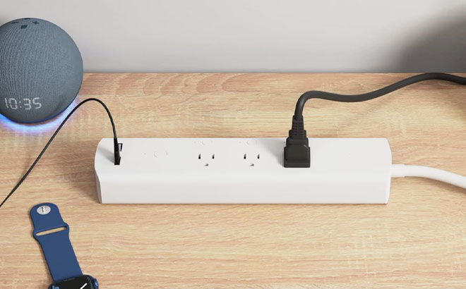 Amazon Smart Plug 3 Outlet Surge Protector Power Strip on a Table