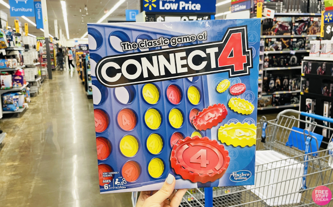 Hand Holding Connect 4 Classic Grid Board Game