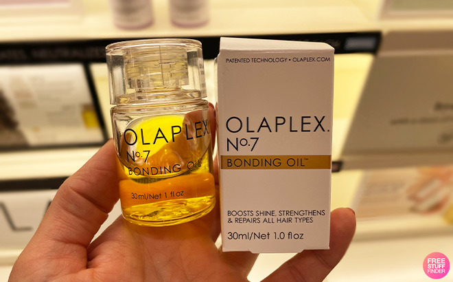Hand Holding Olaplex Bonding Oil