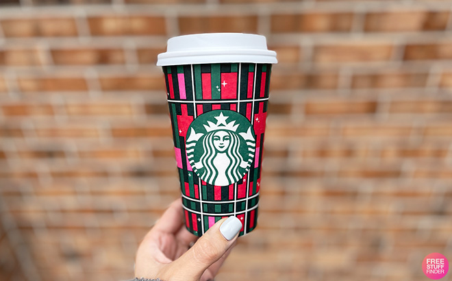 Hand Holding Starbucks Holiday Cup