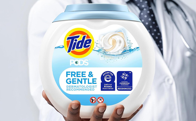 Hand Holding Tide Pods Free and Gentle Laundry Detergent Soap