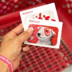 Hand Holding Two Target Gift Cards