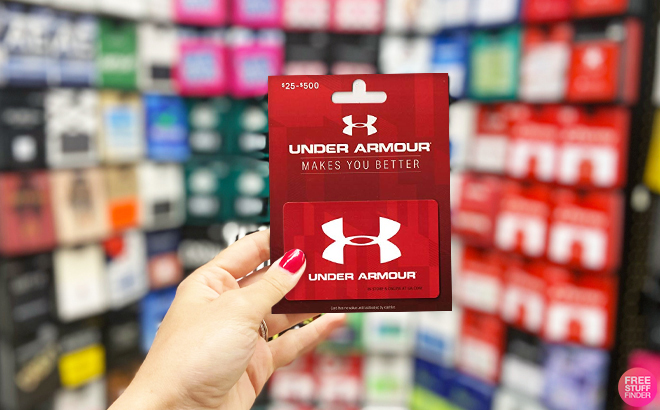 Hand Holding Under Armour Gift Card