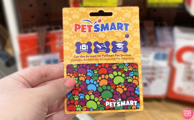 Hand Holding a PetSmart Gift Card