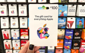 Hand Holding an Apple Gift Card