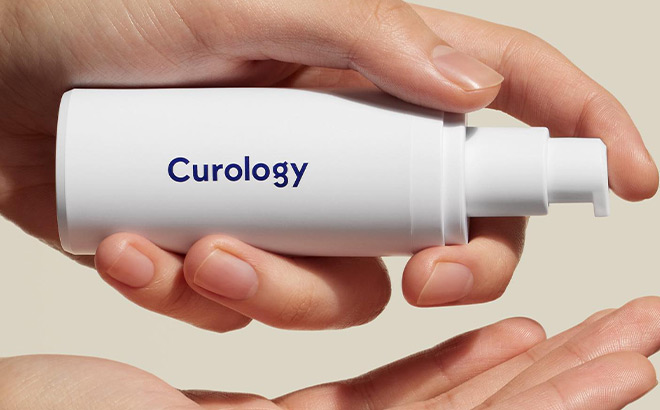 Hands Holding Curology Product
