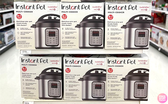 Six Instant Pot 6-Quart 9-in-1 Pressure Cookers in Original Packaging at a Store