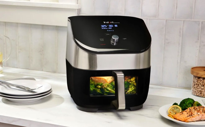 Instant Pot 6 Quart Air Fryer Oven on a Kitchen Table Instant Pot 6 Quart Air Fryer Oven on a Kitchen Table