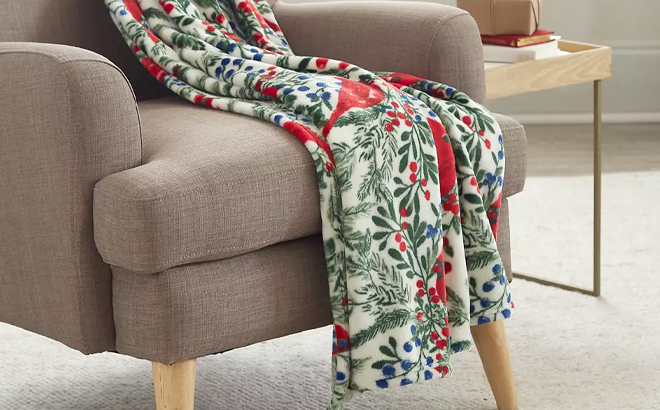 Joyland Printed Plush Throw Blanket on a Chair