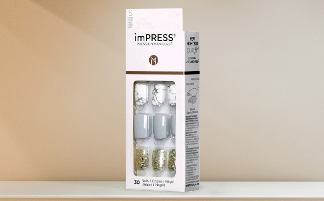 KISS imPRESS Press On Nails on table