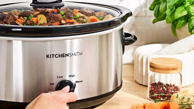 KitchenSmith by Bella 6 Quart Manual Slow Cooker with Food on a Table