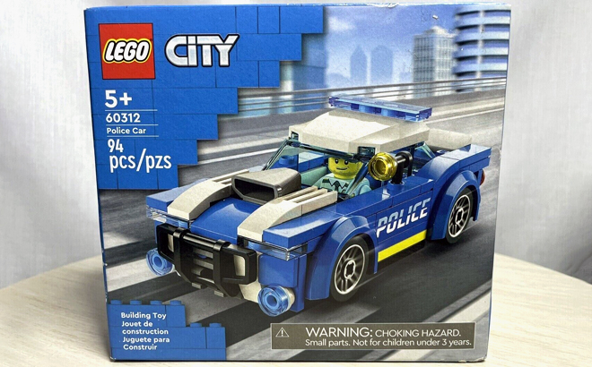 LEGO City Police Car Toy Building Set in Original Packaging on a Tabletop