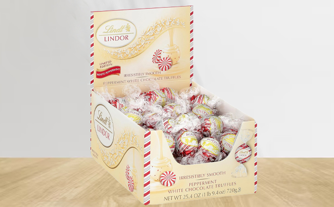Lindt Lindor Holiday White Chocolate Peppermint Candy Truffles 60 Count on a Table