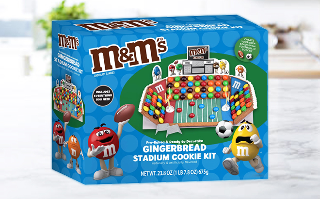MMs Ready to Decorate Gingerbread Stadium Cookie Kit on the Kitchen Table