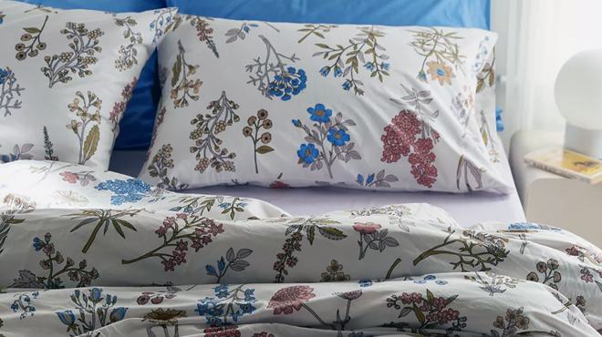 Myla Floral Print Duvet Set on bed