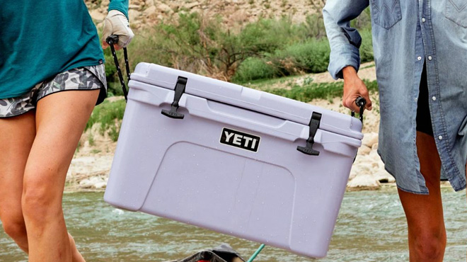 People Holding YETI Tundra 35 Cooler in a Cosmic Lilac Color