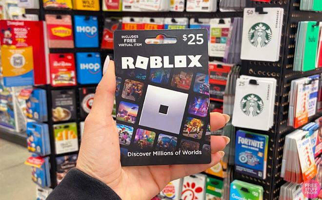 Person Holding Roblox Gift Card
