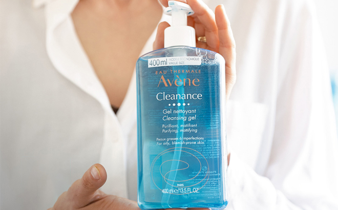 Person Holding a Bottle of Avene Cleanance Cleansing Gel