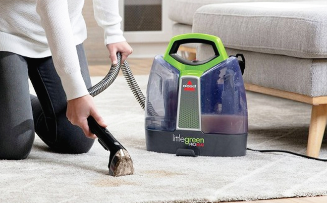 Person Using a Bissell Little Green ProHeat Portable Carpet Cleaner