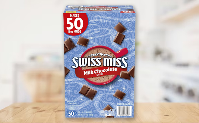 Swiss Miss Milk Chocolate Hot Cocoa Mix Packets 50 Count on a Table
