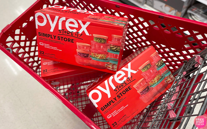 Three Boxes of Pyrex 22 Piece Glass Food Storage Container Set in a Cart at Target