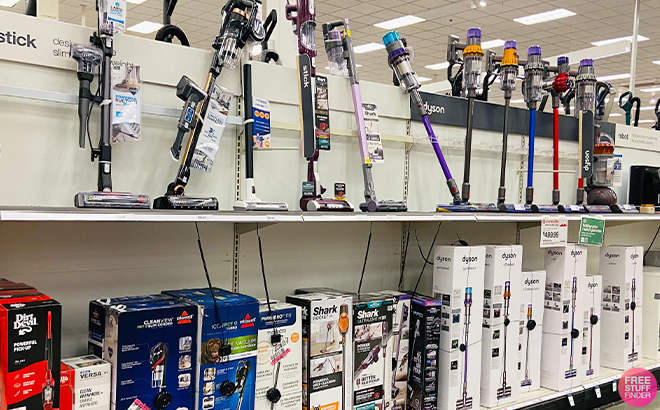 Dyson, Shark, Bissell, and Dirt Devil Vacuums on Shelves at Target