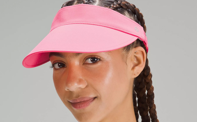 Woman Wearing a Lululemon Fast Paced Wide Band Visor