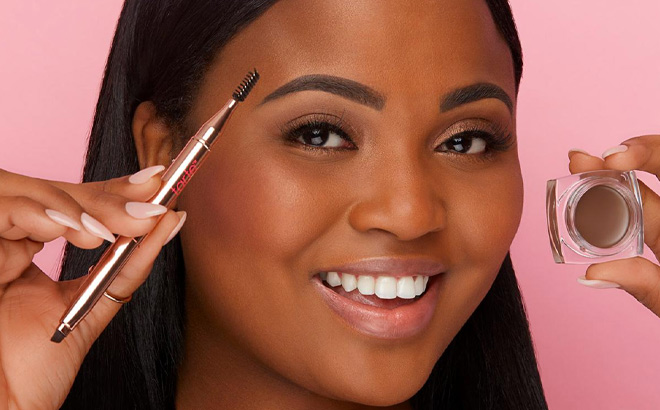 Woman is Holding Tarte Frameworker Brow and Brush