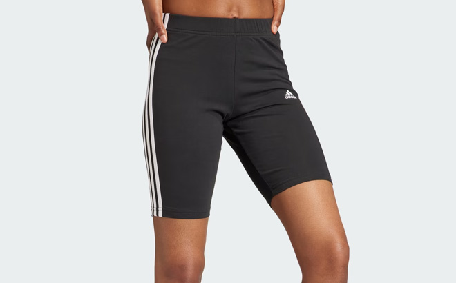 Woman is Wearing Adidas Essentials Bike Shorts in Black Color