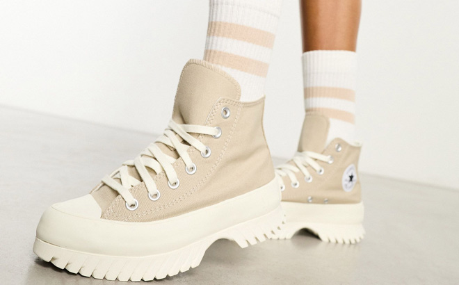Woman is Wearing Converse Chuck Taylor All Star Platform Sneakers in Beige Color