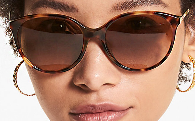 Woman is Wearing Michael Kors Cruz Bay Sunglasses
