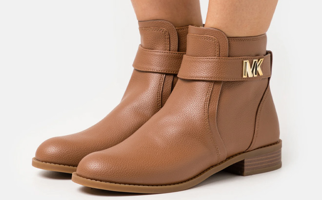 Woman is Wearing Michael Kors Womens Jilly Flat Booties