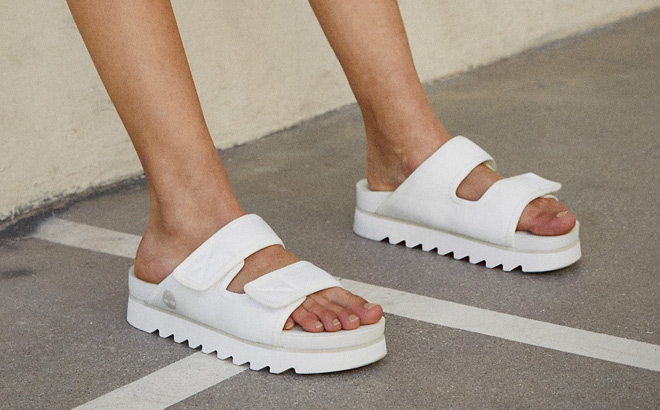 Woman is Wearing Timberland Womens Santa Monica Sunrise Double Strap Sandals in White Color