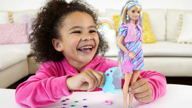 a Girl Playing with Barbie Totally Hair Fashion Doll Set