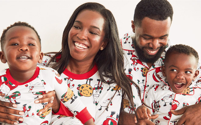 an Image of a Family Wearing Carters Family Holiday Pajamas