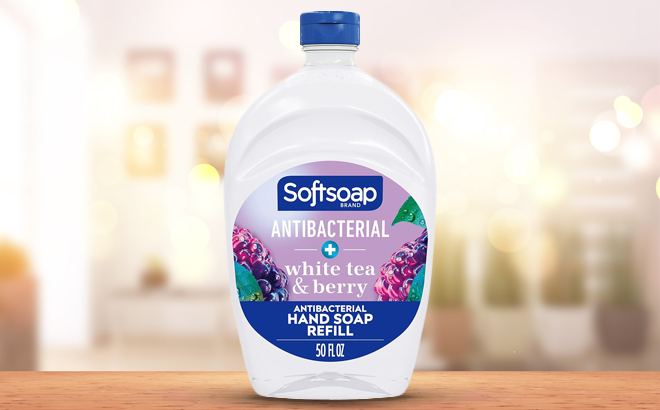 an Image of a Softsoap 50 Ounce Handsoap Bottle on a Wooden Table