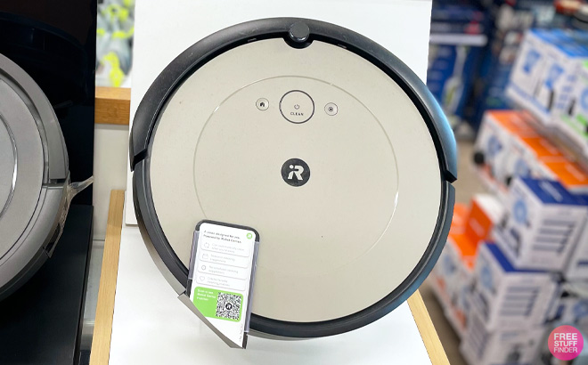 iRobot Roomba i1 Wi-Fi Connected Robot Vacuum on a Store Shelf