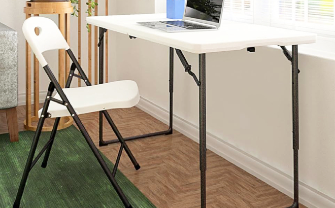 4 Foot Folding Utility Table in a Room