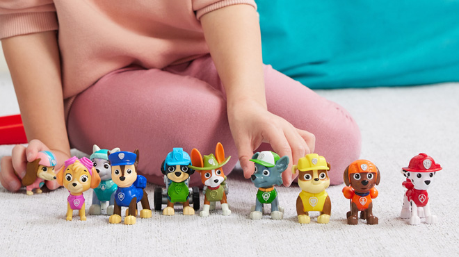 A Child Playing with PAW Patrol 10 Collectible Toy Figures A Child Playing with PAW Patrol 10 Collectible Toy Figures