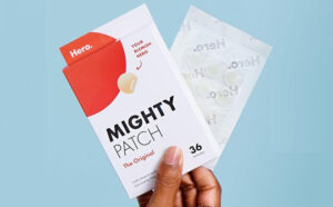 A Hand Holding a 36 pack of Mighty Patch Original Acne Patches