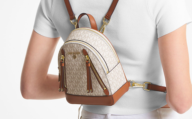 A Person Wearing Michael Kors Mini Backpack A Person Wearing Michael Kors Mini Backpack